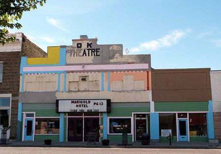OK Theatre facade after modern marquee and second story windows were covered.