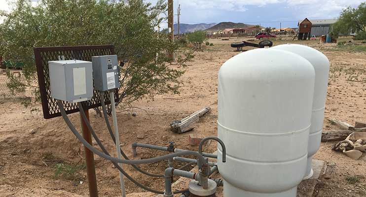 Rural well system with tanks and controls. Rural well system with tanks and controls.