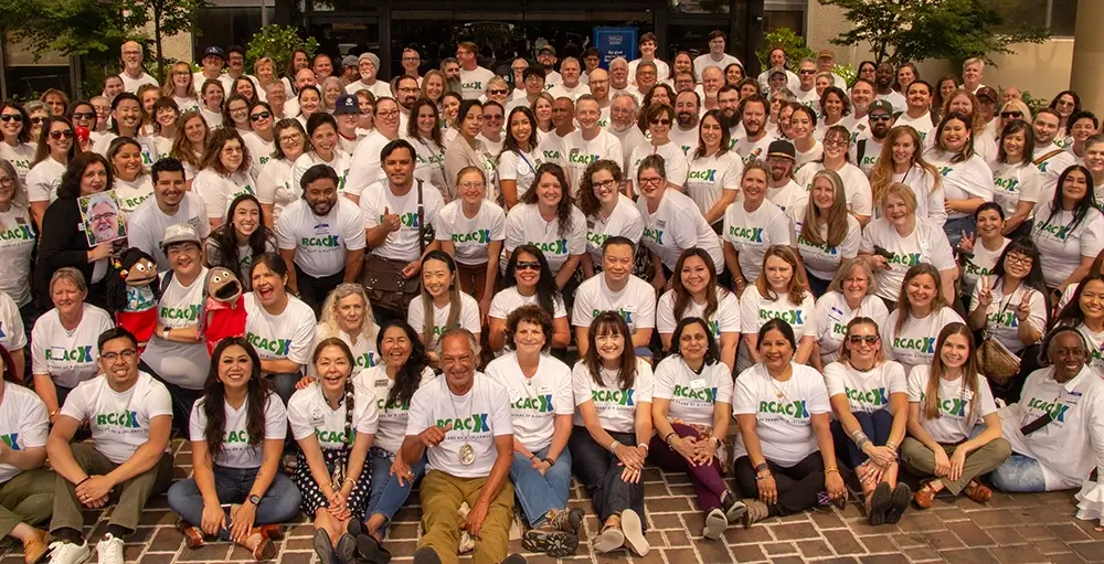 Large group of people in matching shirts. Large group of people in matching shirts.